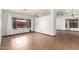 Open living space with tile floors, neutral walls, and access to the outdoor patio through sliding glass doors at 4901 S Vista Pl, Chandler, AZ 85248