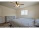 Bedroom featuring a dresser and ceiling fan at 5317 E Baltimore St, Mesa, AZ 85205