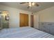 Bedroom with closet, dresser, and ensuite bathroom at 5317 E Baltimore St, Mesa, AZ 85205