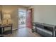 Inviting home foyer featuring wood laminate flooring, a security door and neutral paint at 5317 E Baltimore St, Mesa, AZ 85205