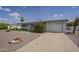 Charming single-story home with desert landscaping, a driveway, and a well-maintained front yard at 5317 E Baltimore St, Mesa, AZ 85205