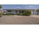 Charming single-story home with desert landscaping and a well-maintained front yard at 5317 E Baltimore St, Mesa, AZ 85205