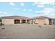 Expansive backyard featuring outdoor bar, pergola, desert landscaping, and tile roof at 5523 W Creekside Ln, San Tan Valley, AZ 85144