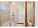 Bright bathroom featuring a large walk-in shower and a private toilet room at 5523 W Creekside Ln, San Tan Valley, AZ 85144