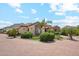 Beautiful home with tiled roof, manicured landscaping, and circular driveway at 5523 W Creekside Ln, San Tan Valley, AZ 85144