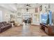 Large living room with tile flooring and a large open arched doorway at 5523 W Creekside Ln, San Tan Valley, AZ 85144