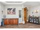 The large living room features decorative columns, display shelving, and tile flooring at 5523 W Creekside Ln, San Tan Valley, AZ 85144