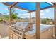 Outdoor kitchen featuring a gas grill, countertop space, and mountain views for outdoor cooking and dining at 5523 W Creekside Ln, San Tan Valley, AZ 85144