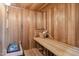 Relaxing wooden sauna with bench seating and traditional sauna accessories at 5523 W Creekside Ln, San Tan Valley, AZ 85144