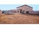Spacious backyard with a trampoline, fence and desert landscaping at 559 W Viola St, Casa Grande, AZ 85122