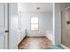 Bright bathroom with a double vanity, large window, and separate tub and shower at 559 W Viola St, Casa Grande, AZ 85122