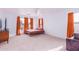 Bright bedroom featuring a comfortable bed, stylish curtains, and a view of the neighborhood at 559 W Viola St, Casa Grande, AZ 85122
