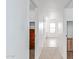 Hallway with closets and carpet flooring leading to rooms with natural light at 559 W Viola St, Casa Grande, AZ 85122