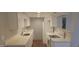 Bright kitchen features white cabinets, sleek countertops, and modern appliances for a clean, contemporary look at 600 S Dobson Rd # 53, Mesa, AZ 85202