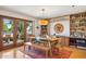 Bright dining area with sliding glass doors and built-in shelving at 6122 E Harvard St, Scottsdale, AZ 85257
