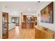 Open-concept living area with hardwood floors and abundant natural light at 6122 E Harvard St, Scottsdale, AZ 85257