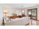 Bright living room with hardwood floors and sliding door to the outdoor space at 6122 E Harvard St, Scottsdale, AZ 85257