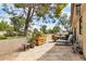 Spacious outdoor patio with comfortable seating, landscaping, and a beautiful view of the property's surroundings at 6122 E Harvard St, Scottsdale, AZ 85257