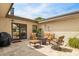 Charming outdoor patio is great for entertaining, with stylish seating, decor, and easy access from the home at 6122 E Harvard St, Scottsdale, AZ 85257