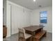 Open dining area featuring seating for six with lots of natural light at 6732 W Pedro Ln, Laveen, AZ 85339