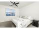 Bright bedroom with neutral walls, carpet floors, and a large window with views at 6732 W Pedro Ln, Laveen, AZ 85339
