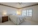 Cozy bedroom with neutral tones, shuttered window, and soft carpet flooring at 7925 E Monte Ave, Mesa, AZ 85209