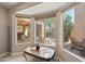 Charming breakfast nook with bay window and views of the patio at 8405 W Utopia Rd, Peoria, AZ 85382