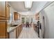 Eat-in kitchen with stainless steel appliances, granite countertops, and lots of natural light at 8405 W Utopia Rd, Peoria, AZ 85382