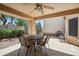 Inviting covered patio with comfortable seating, offering a relaxing outdoor living space at 8405 W Utopia Rd, Peoria, AZ 85382