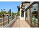 Balcony showcasing dark wood trim and neighborhood view at 8719 E San Marcos Dr, Scottsdale, AZ 85258