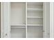 Walk-in closet with white shelving for optimal storage at 8719 E San Marcos Dr, Scottsdale, AZ 85258