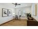 A home office with plantation shutters and plenty of natural light at 8719 E San Marcos Dr, Scottsdale, AZ 85258
