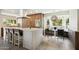 Modern kitchen featuring a large island, stainless steel appliances, and a bright breakfast nook at 8719 E San Marcos Dr, Scottsdale, AZ 85258