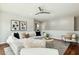 This living room features a neutral color palette, hardwood floors, and recessed lighting at 8719 E San Marcos Dr, Scottsdale, AZ 85258