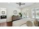 Light-filled main bedroom with closet access and views of the backyard at 8719 E San Marcos Dr, Scottsdale, AZ 85258