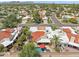 Aerial view of neighborhood featuring red tile roofs, swimming pools, and mature trees at 9019 N 87Th Way, Scottsdale, AZ 85258
