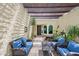 Relaxing courtyard showcasing comfortable seating, privacy, and a soothing water feature, blending indoor/outdoor living at 9019 N 87Th Way, Scottsdale, AZ 85258