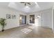 Bright sunroom with tiled floor, skylights, and multiple access points at 9202 N 107Th Ave, Sun City, AZ 85351