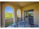 Relaxing outdoor patio with neutral seating and picturesque views of the nearby mountains at 10655 N 9Th St # 115, Phoenix, AZ 85020