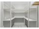 Walk-in pantry with multiple shelves for organized storage at 1240 E Indigo St, Mesa, AZ 85203