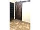 Charming interior featuring a rustic wood sliding door at 1358 S Royal Palm Rd, Apache Junction, AZ 85119