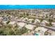 Expansive aerial view of a residential neighborhood, showcasing single-Gathering homes and green spaces at 1777 W Redfield Rd, Gilbert, AZ 85233
