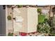 Aerial top-down shows rooftop with manicured backyard with inground pool and artificial turf at 1777 W Redfield Rd, Gilbert, AZ 85233