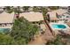 Aerial view of backyard with pool, pergola, and manicured landscaping in a fenced yard at 1777 W Redfield Rd, Gilbert, AZ 85233