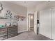 Inviting bedroom with unique decor, featuring a dresser and closet, creating a personalized space at 1777 W Redfield Rd, Gilbert, AZ 85233
