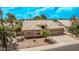 Attractive single-story home featuring a desert-style front yard and arched entryway at 1777 W Redfield Rd, Gilbert, AZ 85233