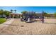 Community playground with modern play equipment and a shaded pavilion for gatherings at 1777 W Redfield Rd, Gilbert, AZ 85233