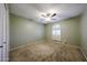 Neutral bedroom featuring carpeting, a ceiling fan and shutters on the window at 4718 W El Caminito Dr, Glendale, AZ 85302