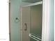 Shower stall enclosed with glass doors at 4718 W El Caminito Dr, Glendale, AZ 85302