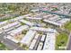 Aerial view of Winfield Place Condominiums showcasing the community layout, landscaping, and Arizona Canal Trail at 7436 E Chaparral Rd # 159B, Scottsdale, AZ 85250